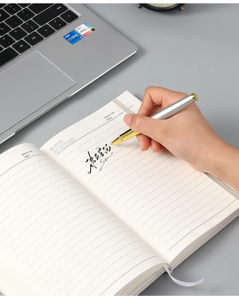 Original supplier view of the ruled journal being used; pen and laptop are not included